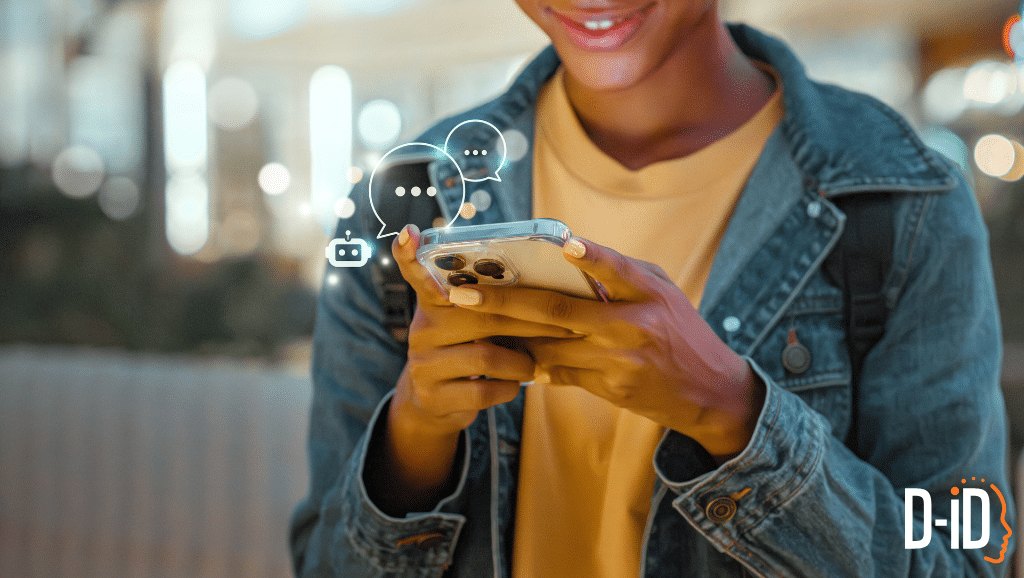 Person smiling while using a smartphone, with digital chat icons appearing above the device, highlighting the power of conversational AI solutions. D-ID logo is visible in the bottom right corner.
